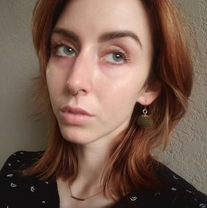 Crocheted moss green dangling earrings